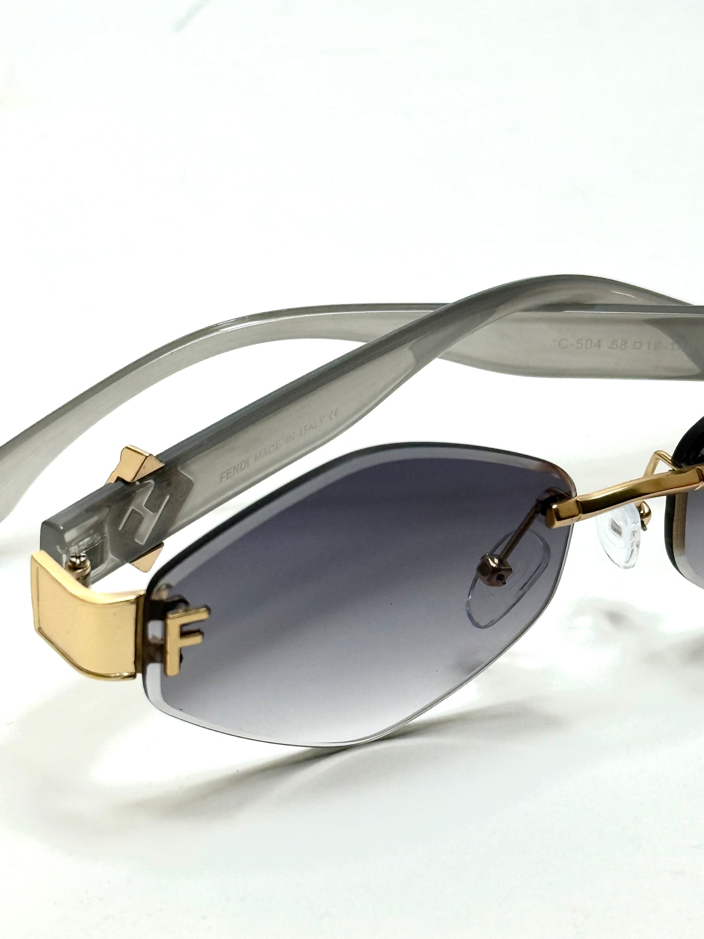 Fendi FF Logo Rimless – Gold Grey