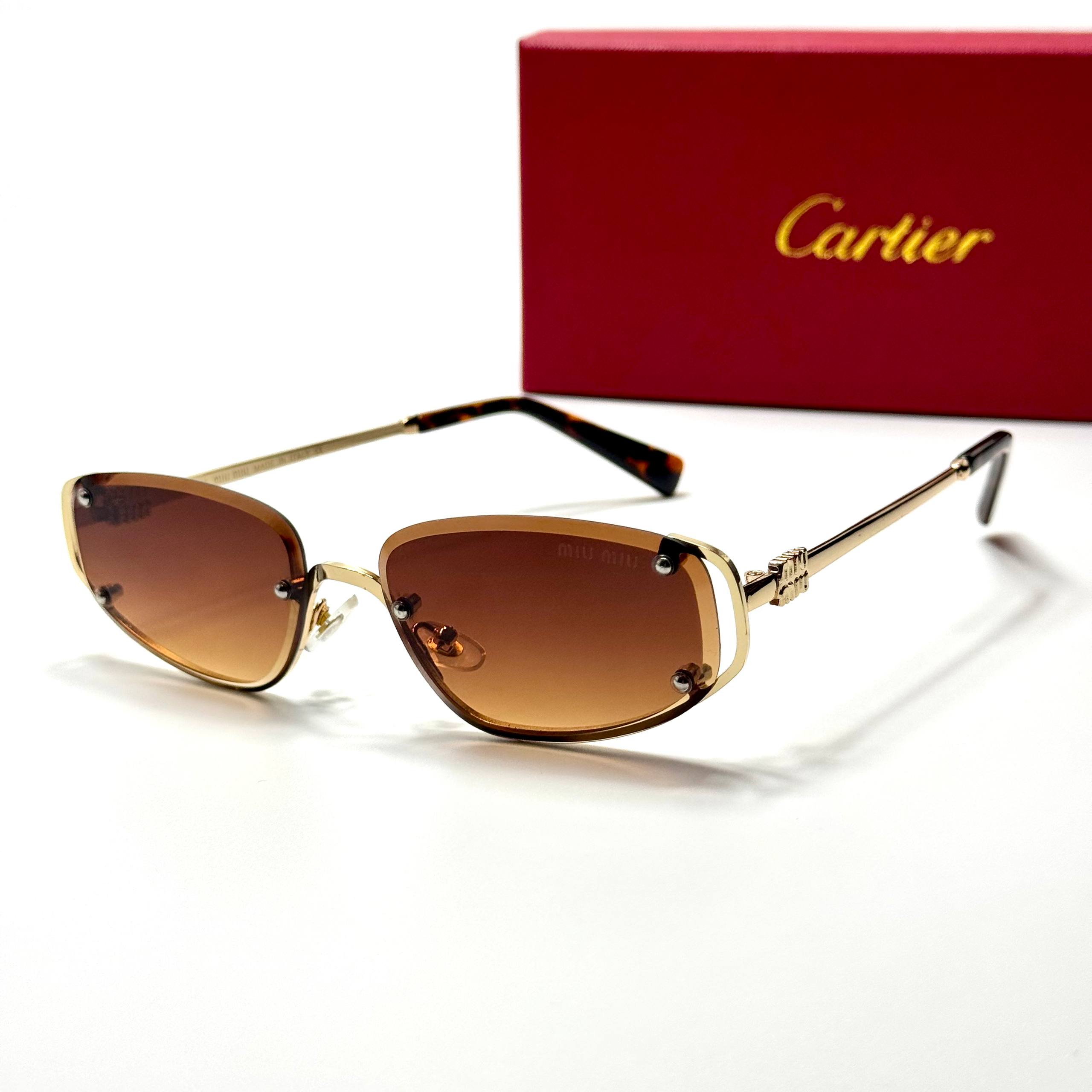 Miu Miu Geometric SMU 11ZS – Gold Brown Gradient