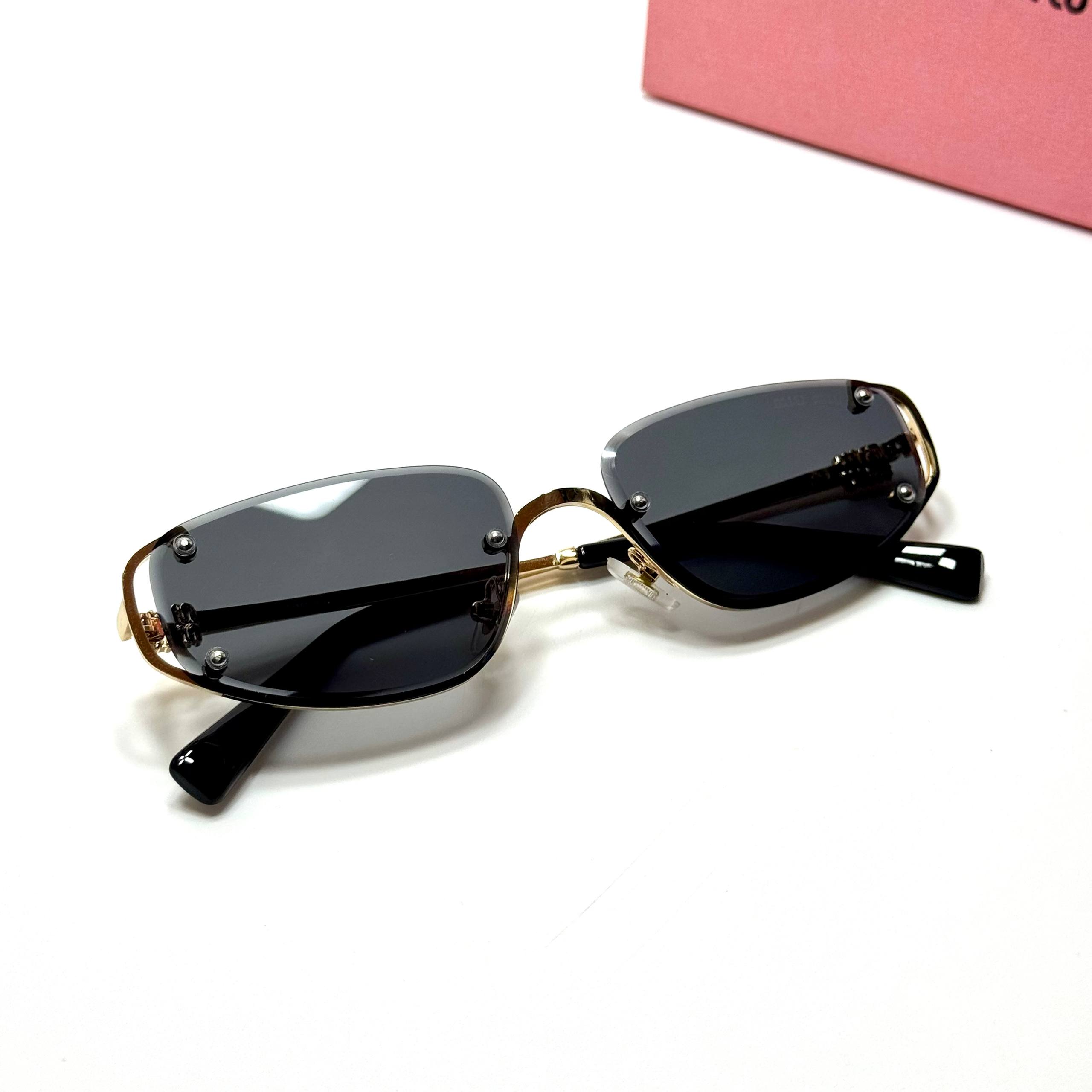 Miu Miu Rimless Rectangular SMU 04ZS – Black