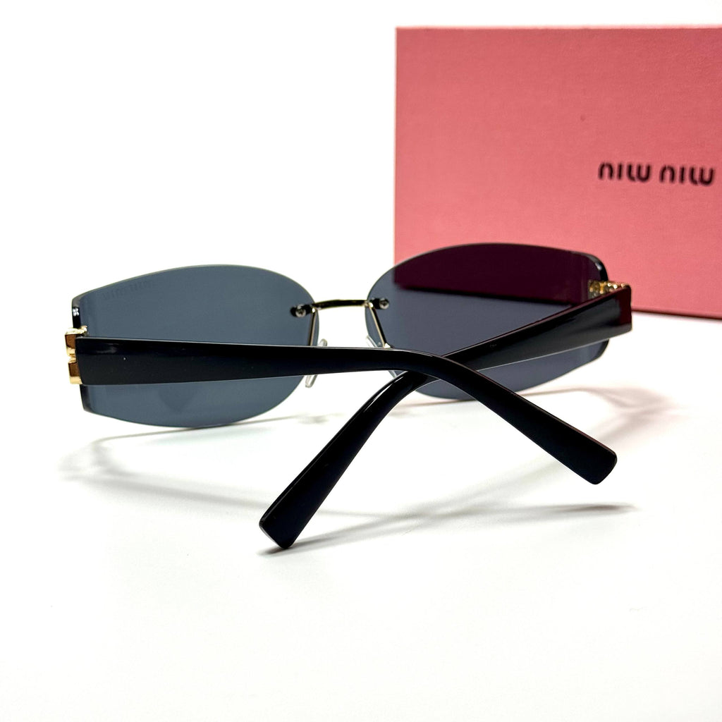 Miu Miu Rimless Rectangular SMU 04ZS – Black
