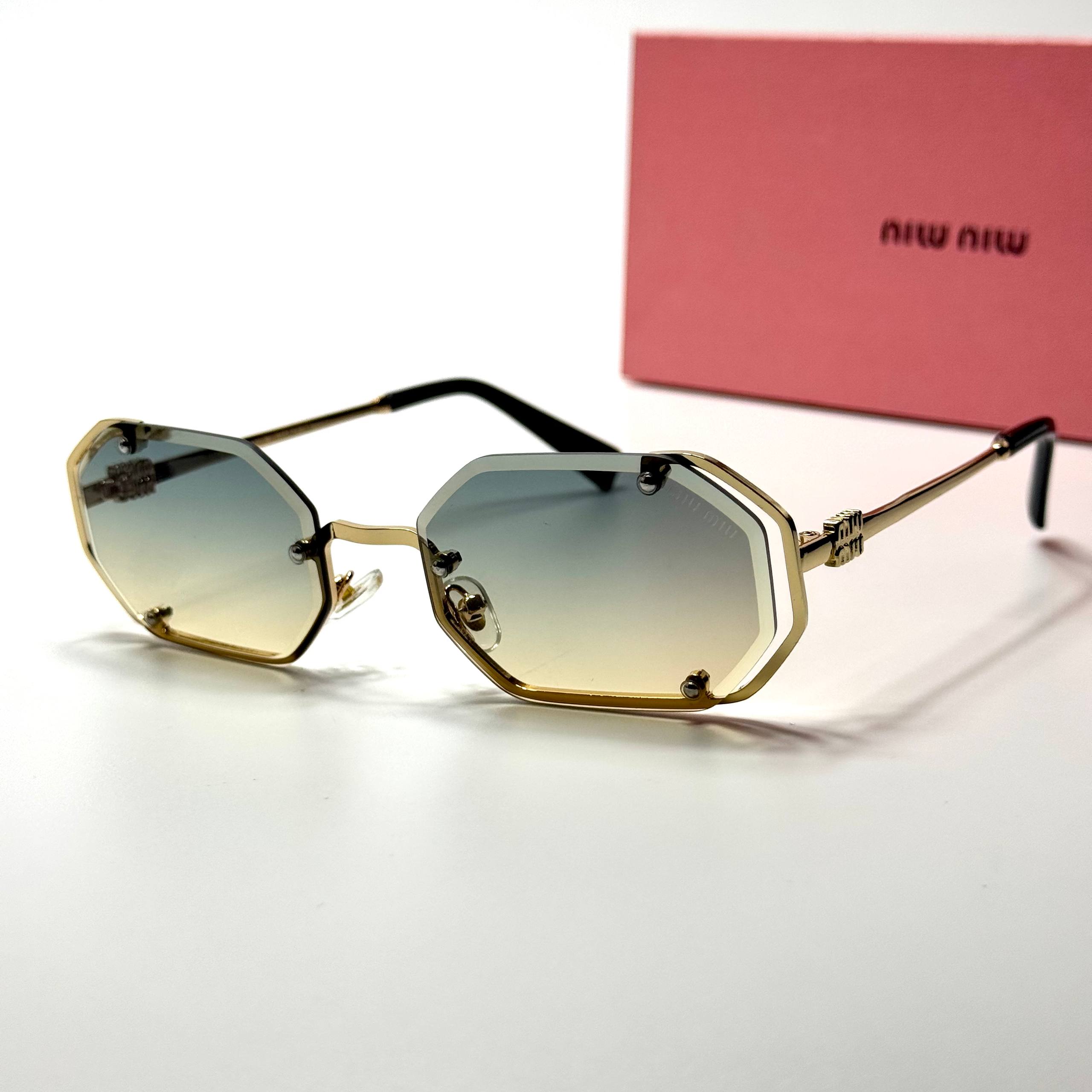 Miu Miu Geometric SMU56Z – Gold Gradient