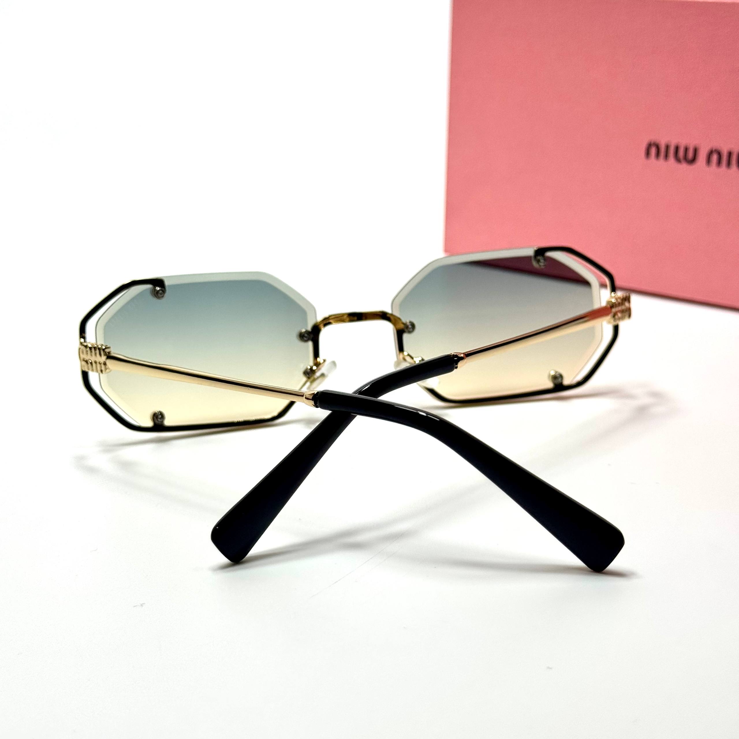 Miu Miu Geometric SMU56Z – Gold Gradient
