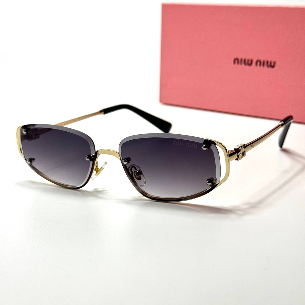 Miu Miu Geometric SMU57Z – Gold Gradient