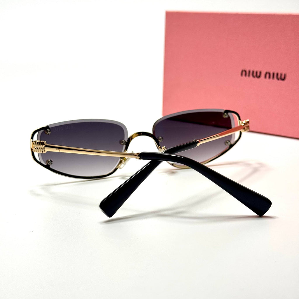 Miu Miu Geometric SMU57Z – Gold Gradient
