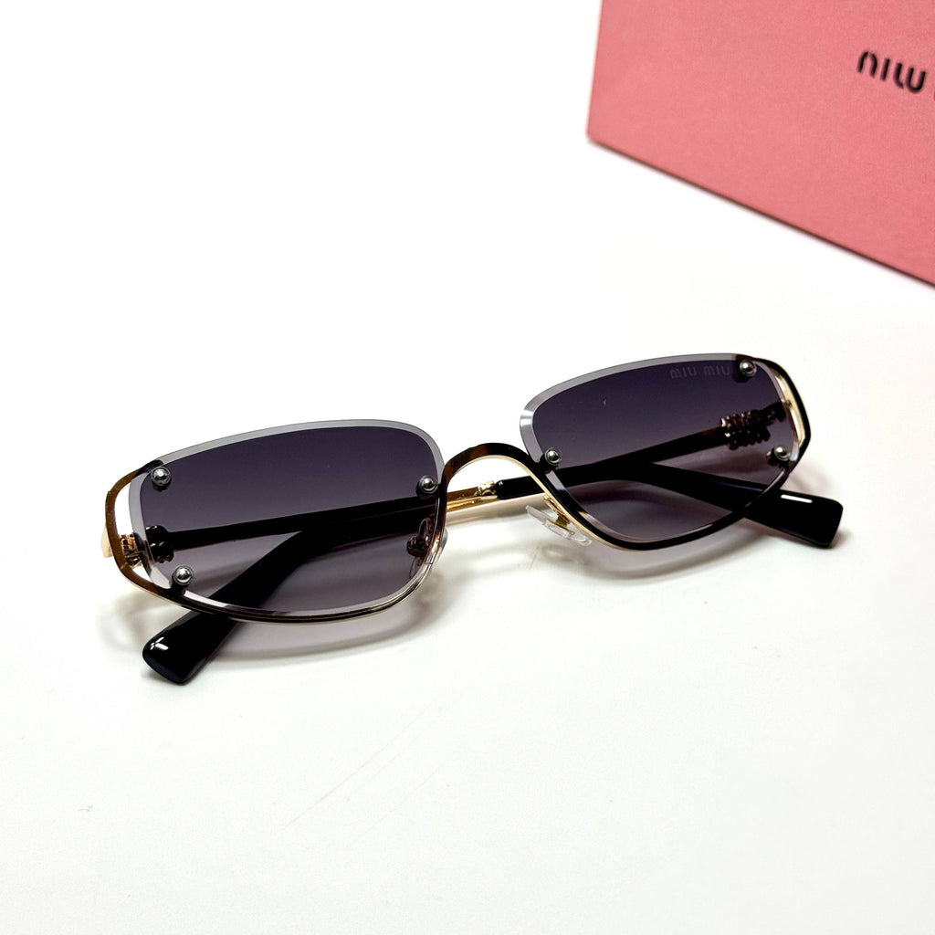 Miu Miu Geometric SMU57Z – Gold Gradient