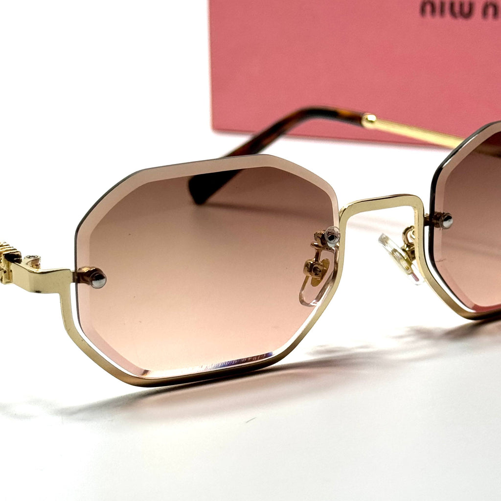 Miu Miu Geometric SMU52W – Gold Pink Gradient