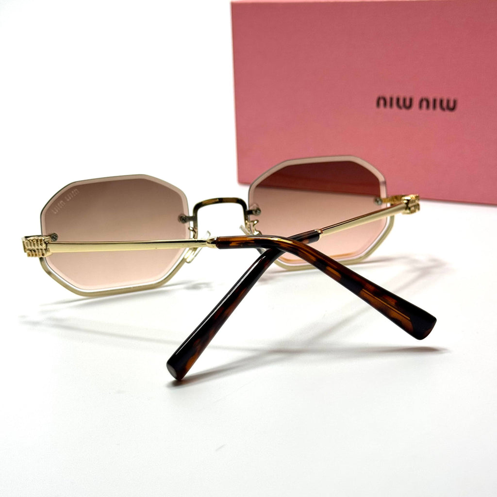 Miu Miu Geometric SMU52W – Gold Pink Gradient