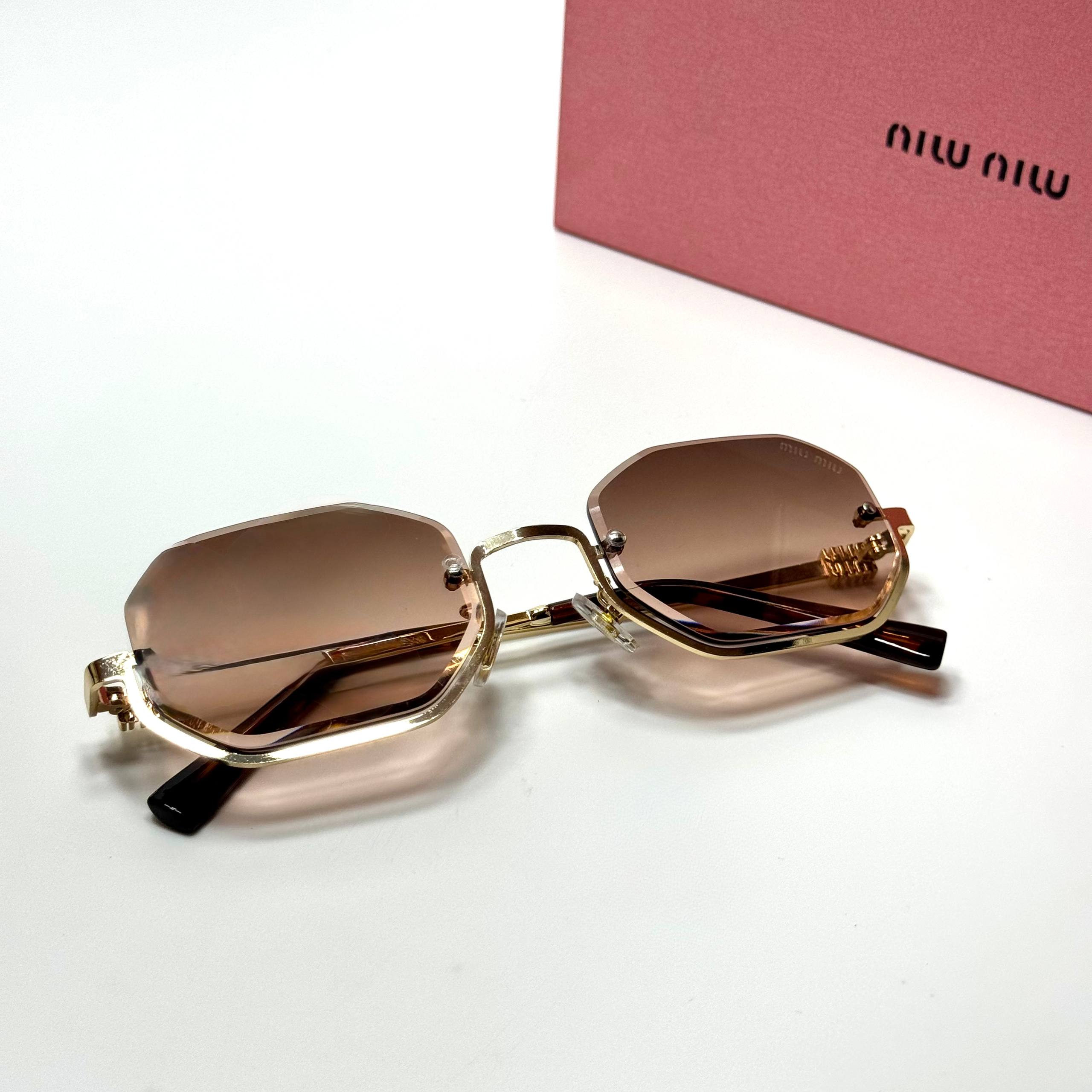 Miu Miu Geometric SMU52W – Gold Pink Gradient