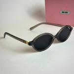 Miu Miu SMU 10Q – Nude Grey