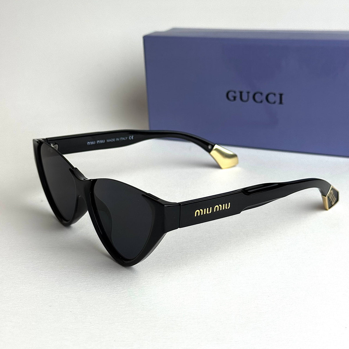 Miu Miu SMUQ9 – Black Gold