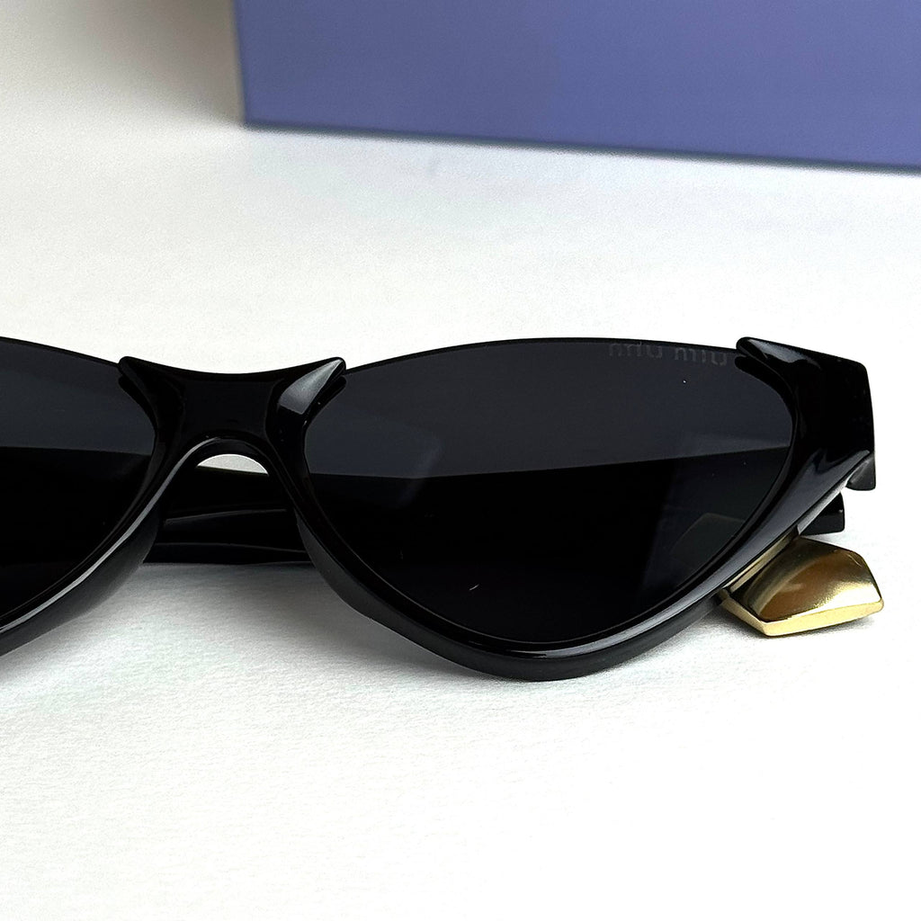 Miu Miu SMUQ9 – Black Gold