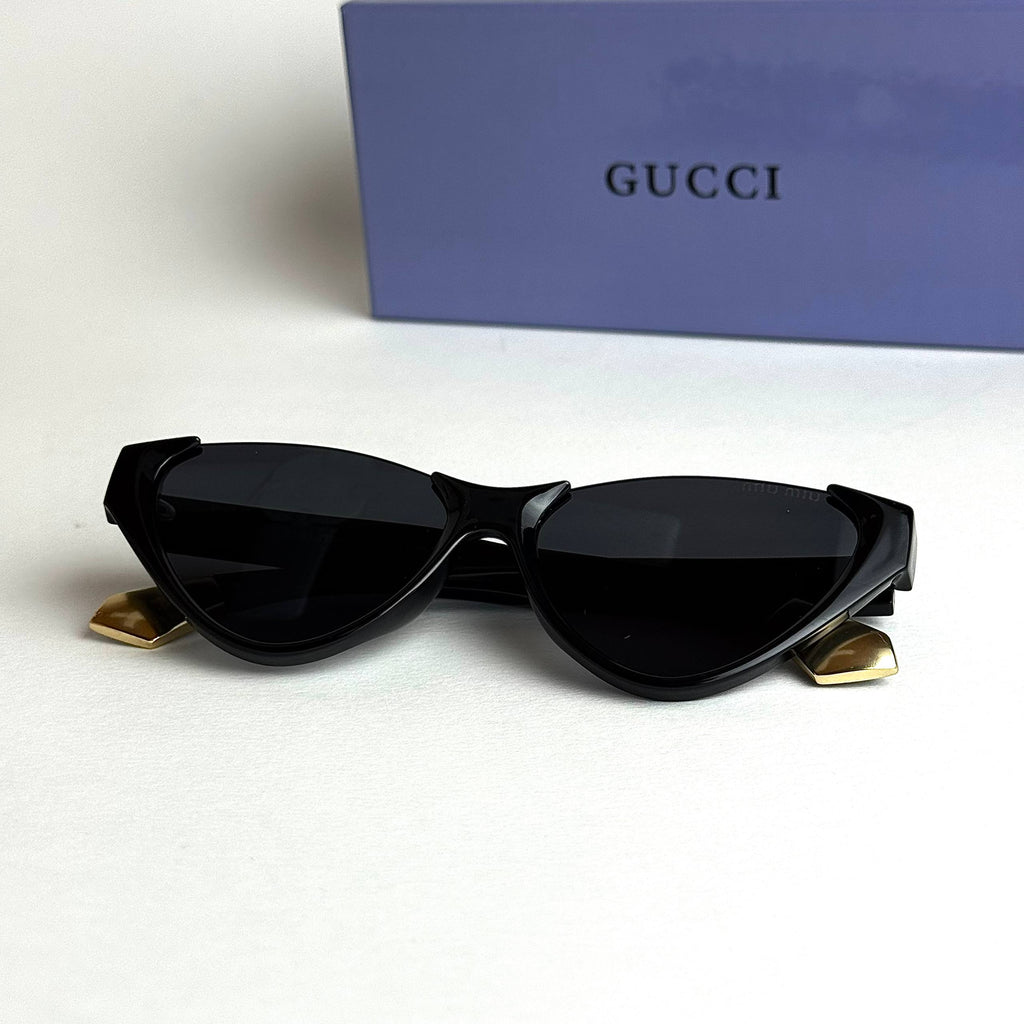 Miu Miu SMUQ9 – Black Gold