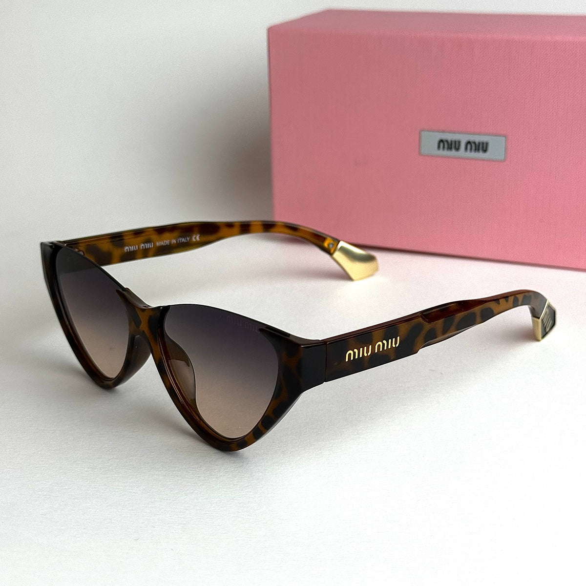 Miu Miu SMUQ9 – Brown Gradient