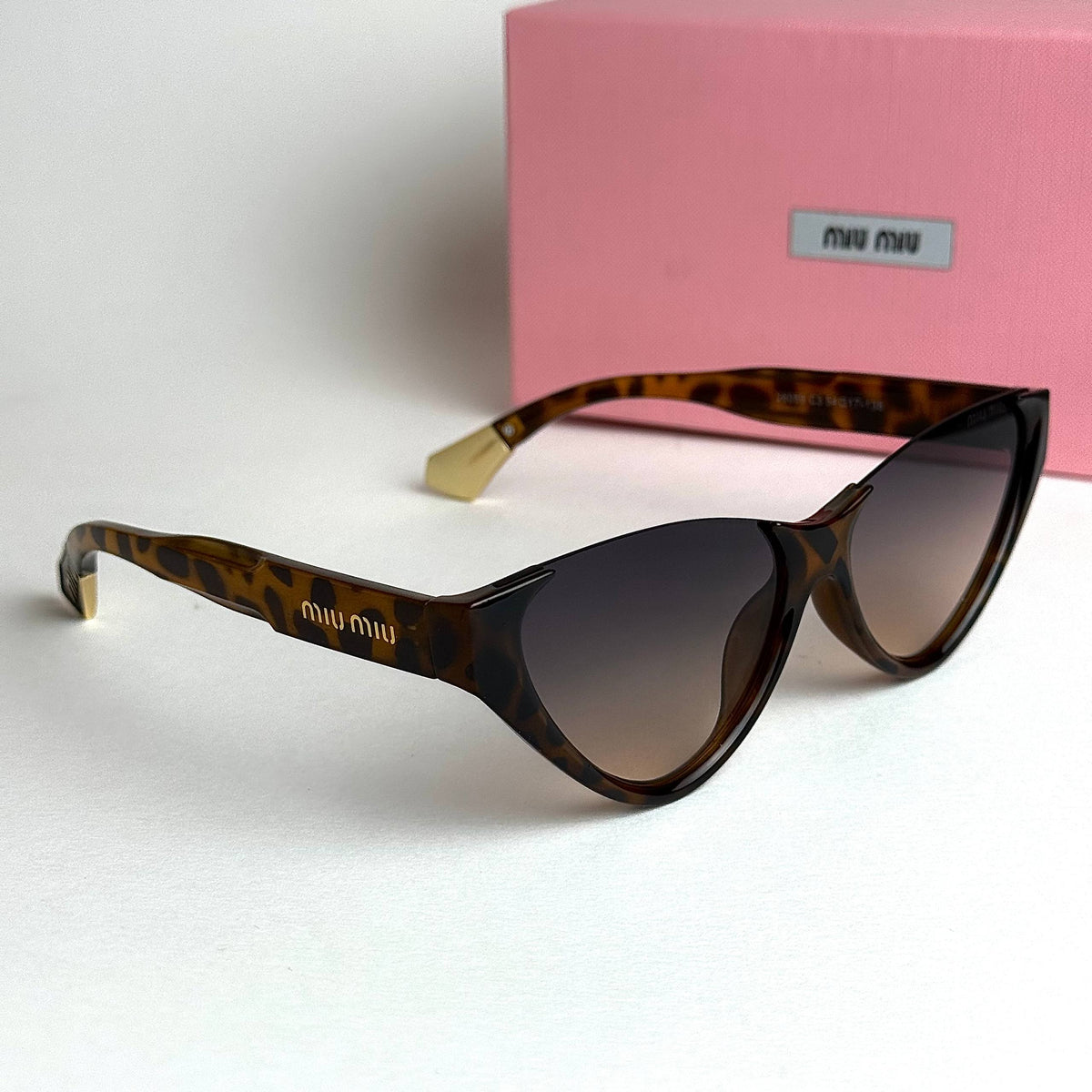Miu Miu SMUQ9 – Brown Gradient
