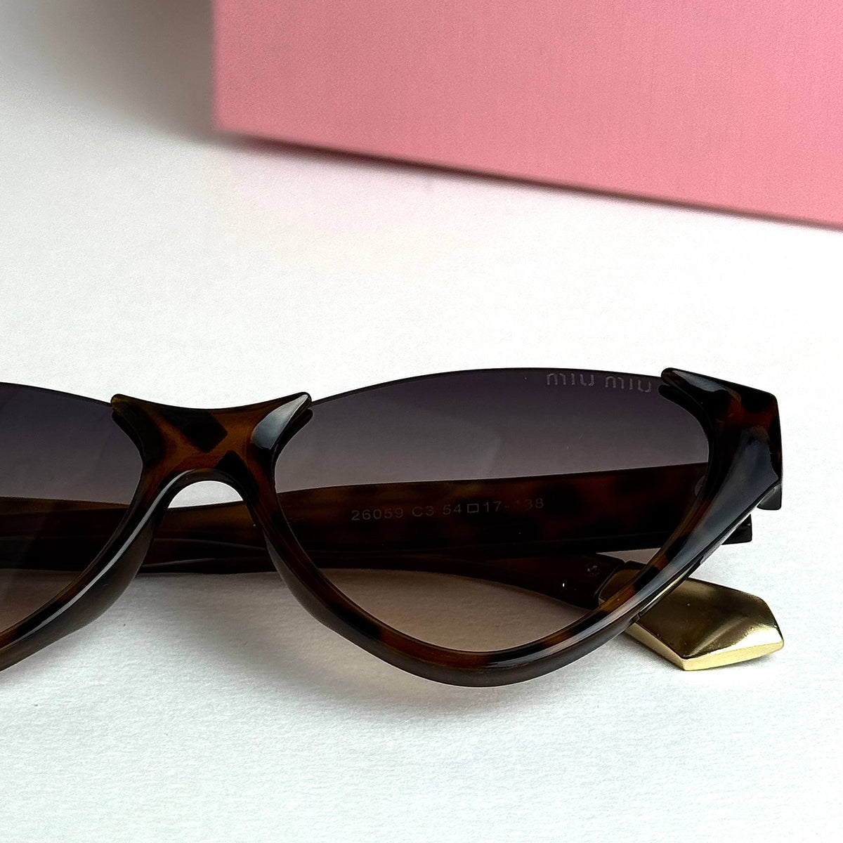 Miu Miu SMUQ9 – Brown Gradient