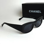 Chanel Signature – Black