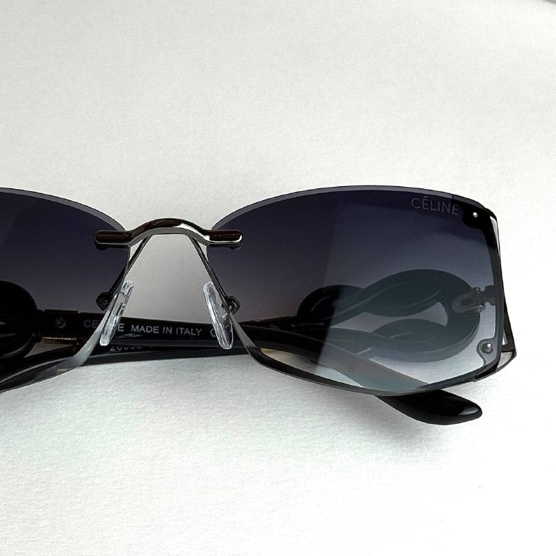 Celine Knot Shield – Black Smoke Gradient