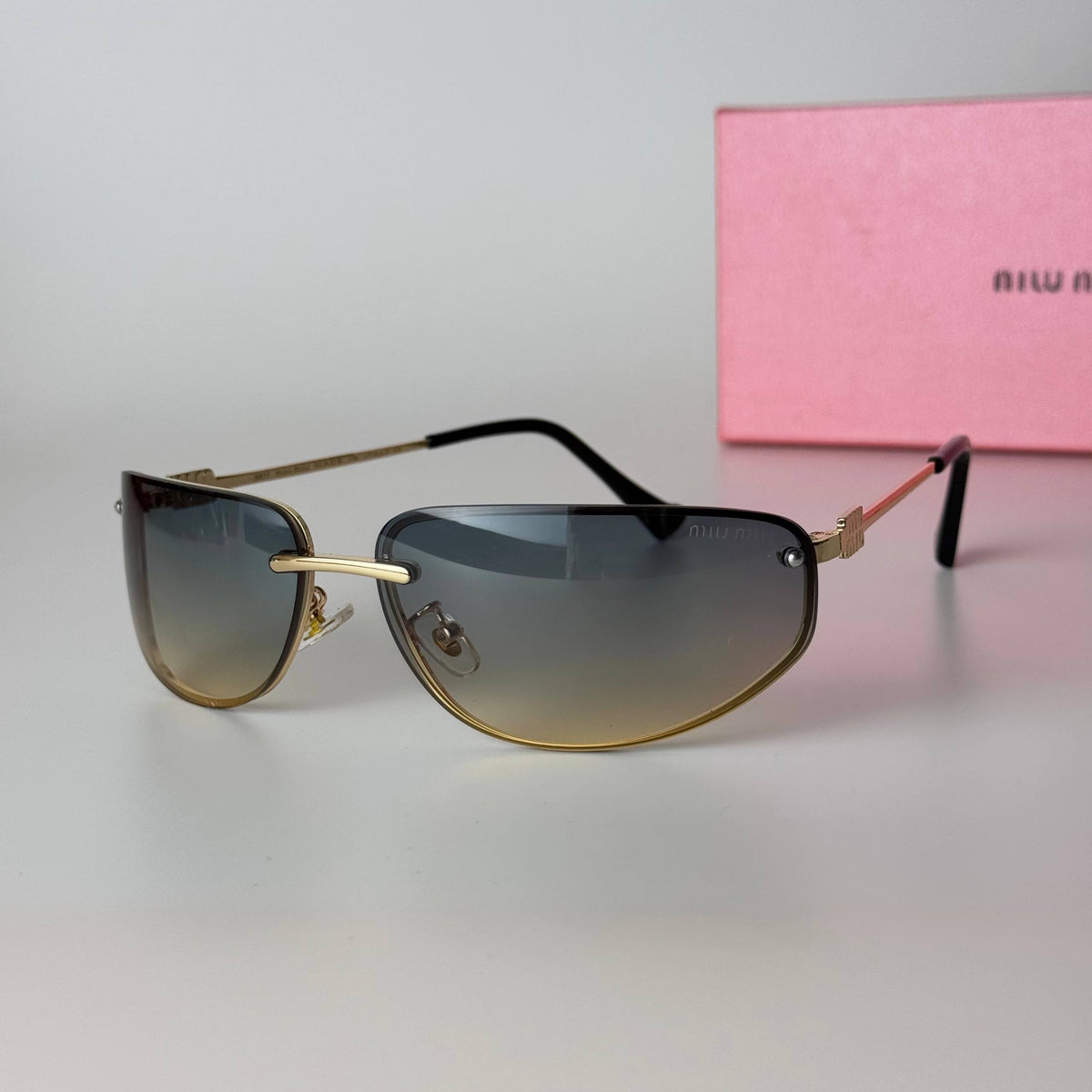 Miu Miu SMU73Z - Gold Grey