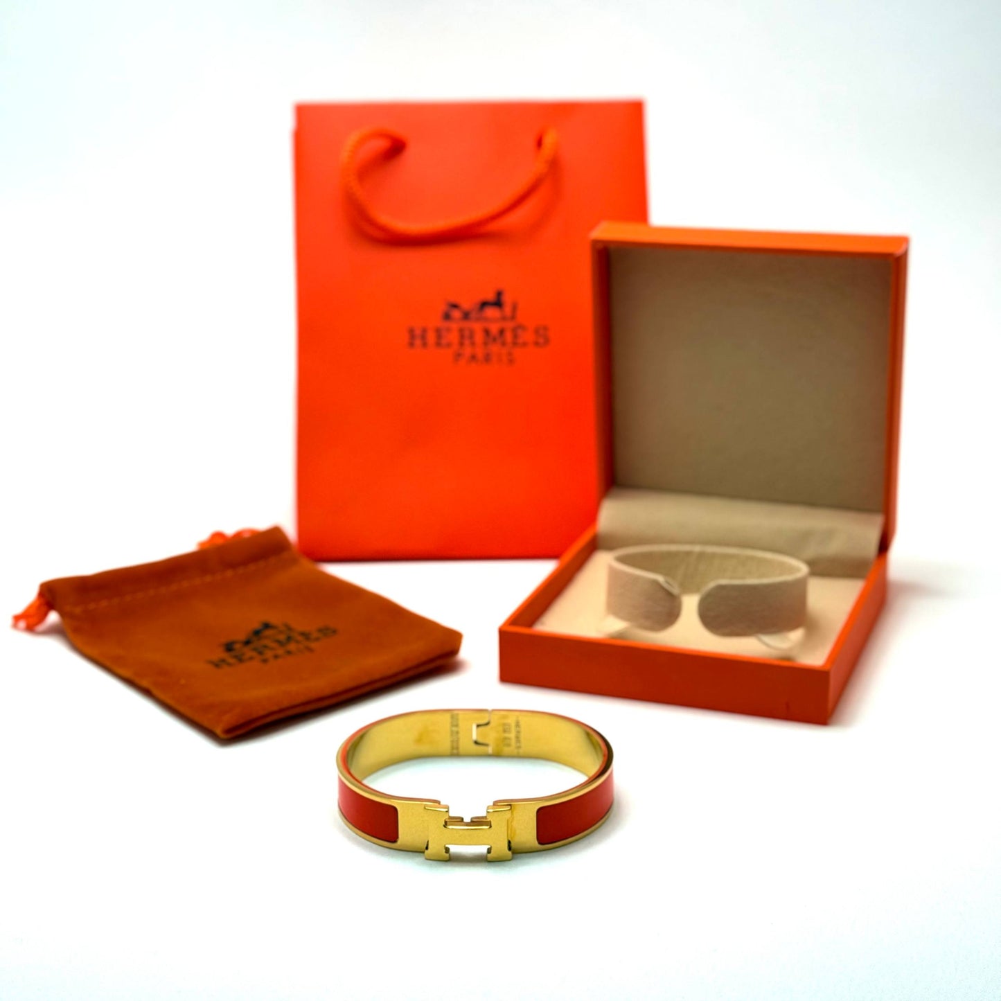 Hermès Clic H — Gold Orange