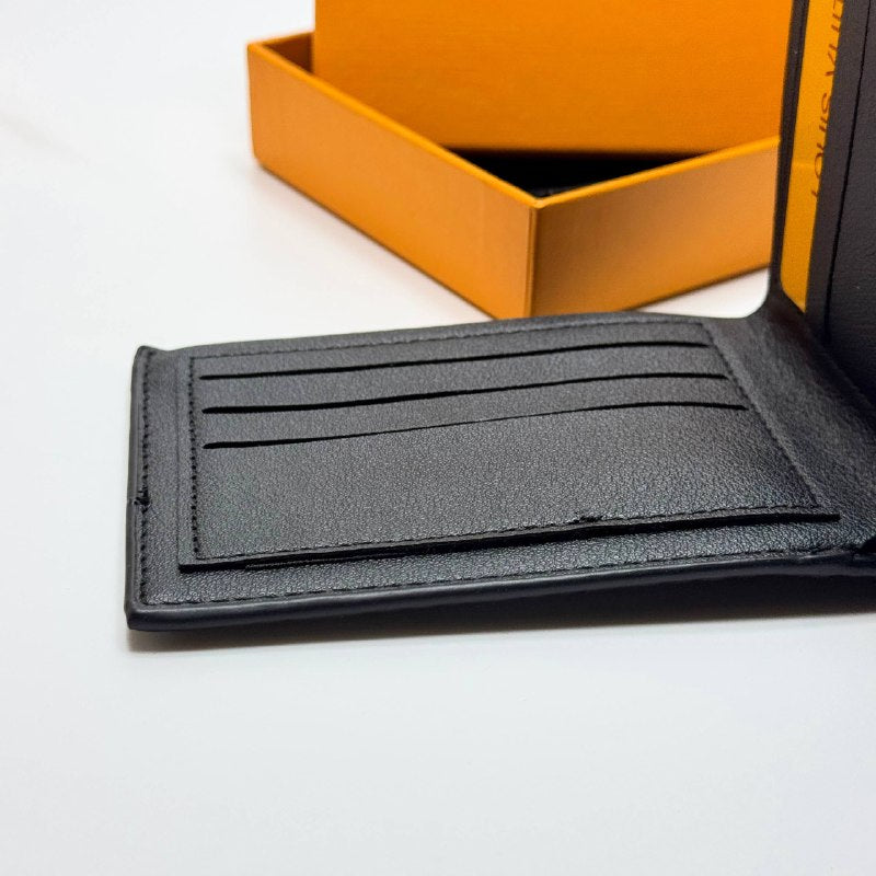 Louis Vuitton Monogram Embossed Bifold Wallet – Black