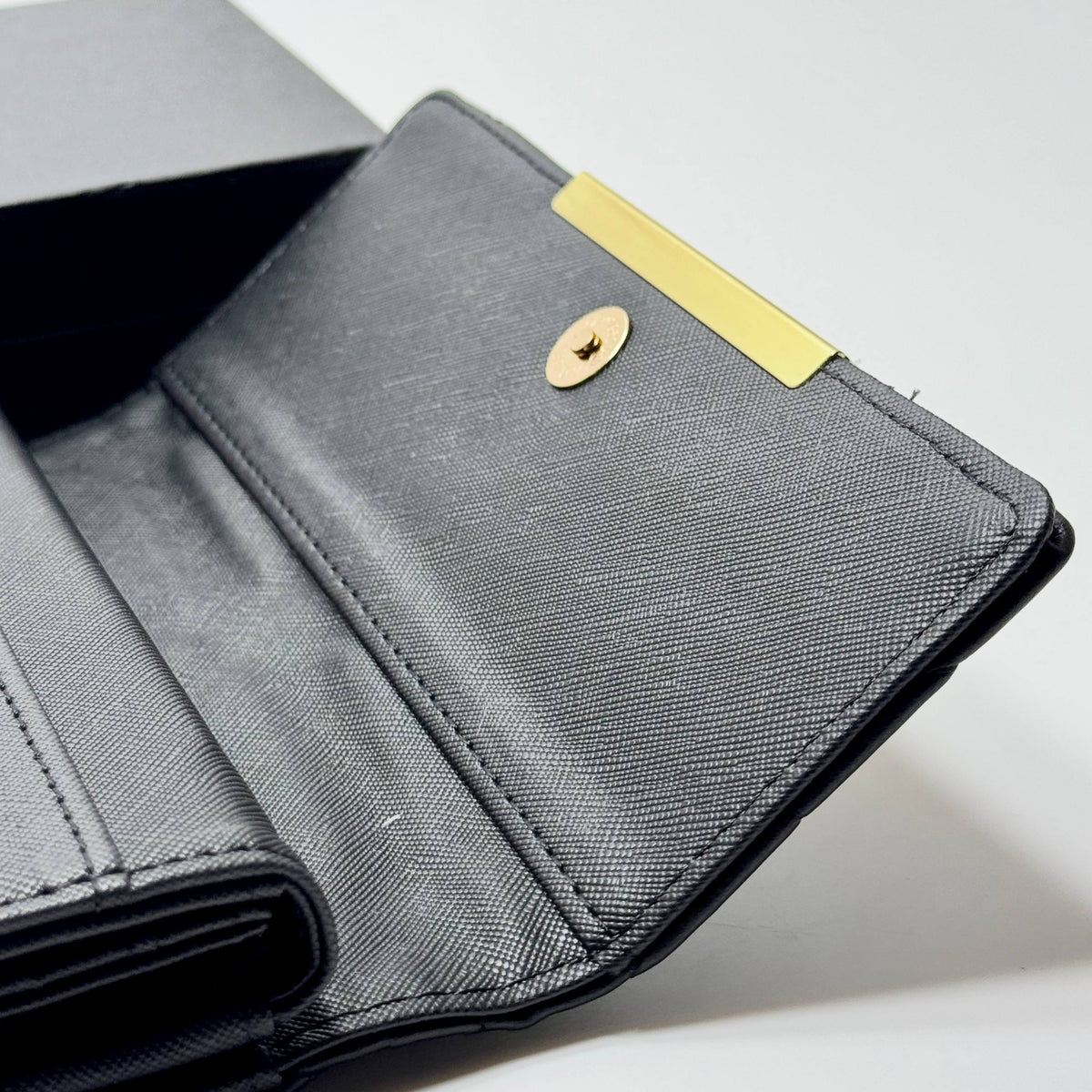 Prada Quilted Triangle Wallet – Black Gold