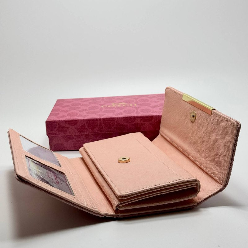 Coach Signature Embossed Continental Wallet – Pink Gold
