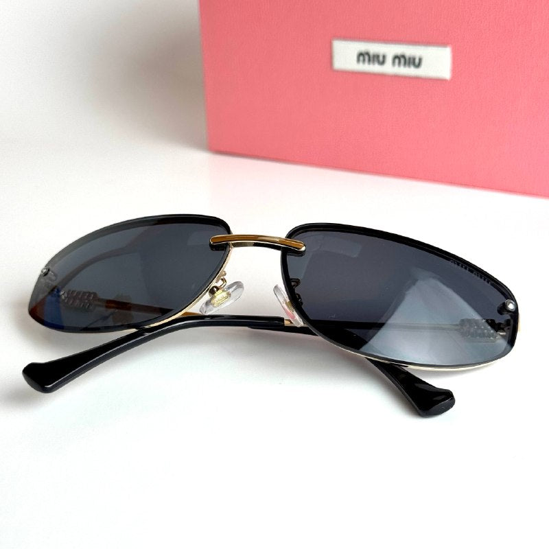 Miu Miu SMU73Z – Gold Black