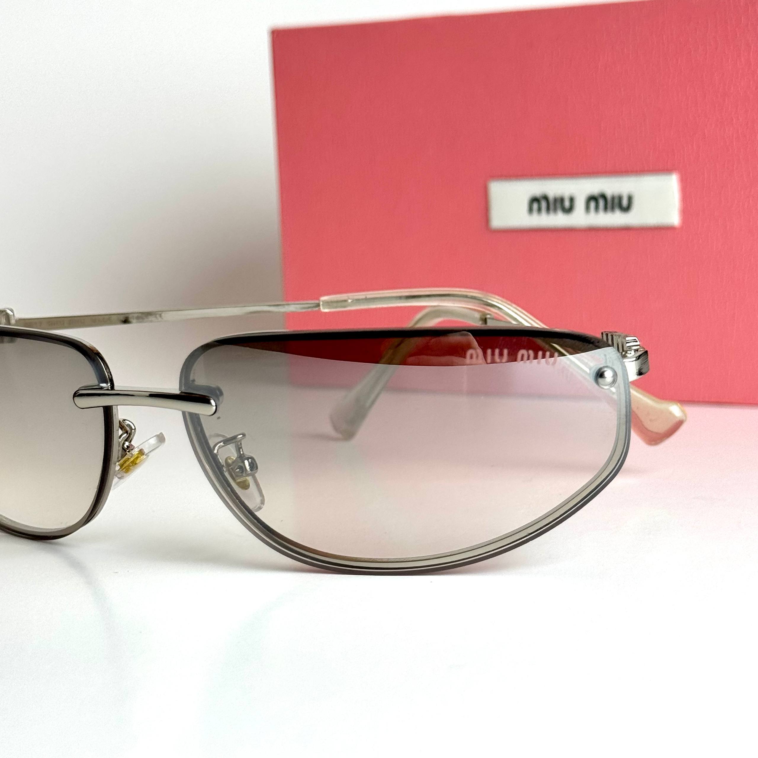 Miu Miu SMU73Z – Silver Grey
