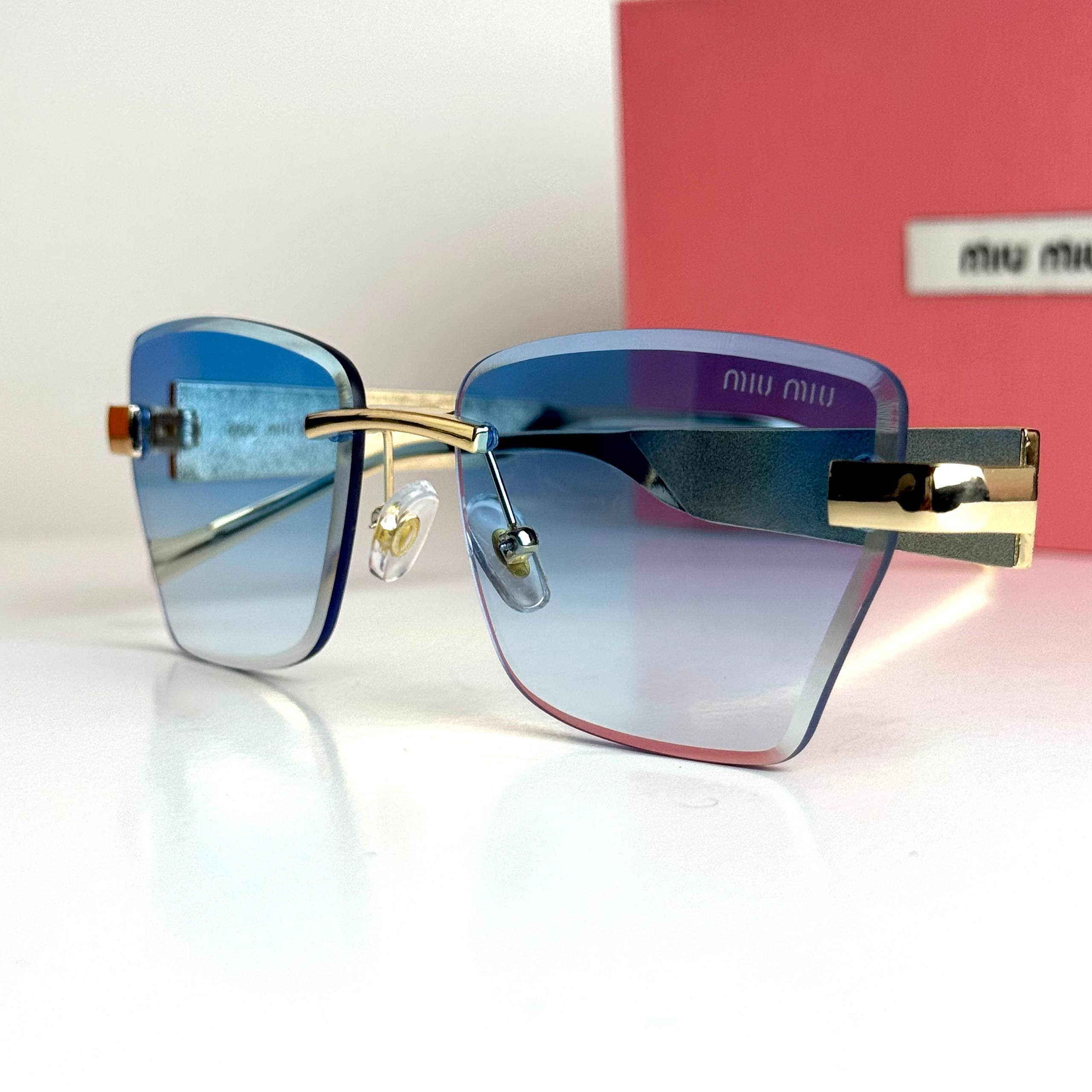 Miu Miu SMU11Z – Gold Blue
