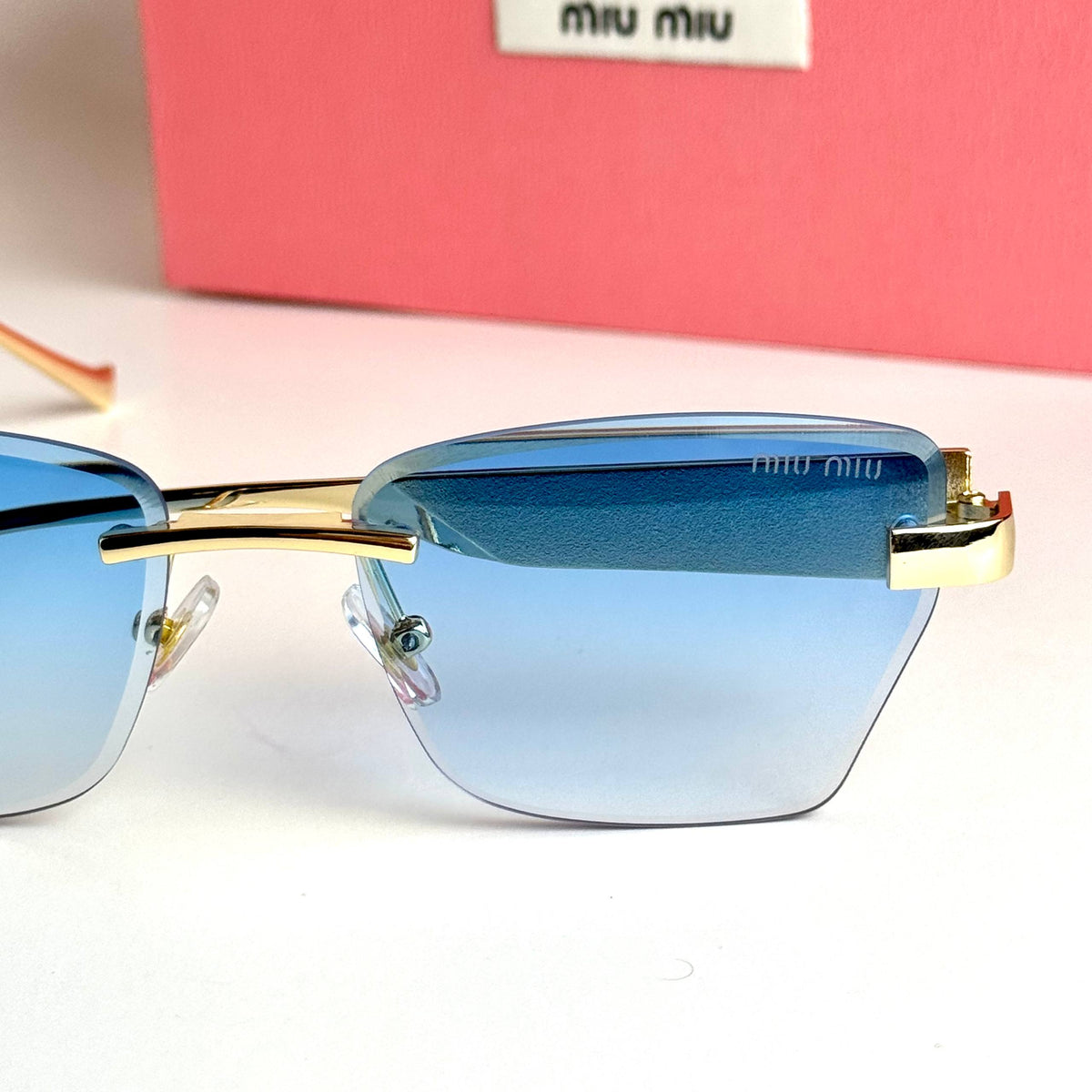 Miu Miu SMU11Z – Gold Blue