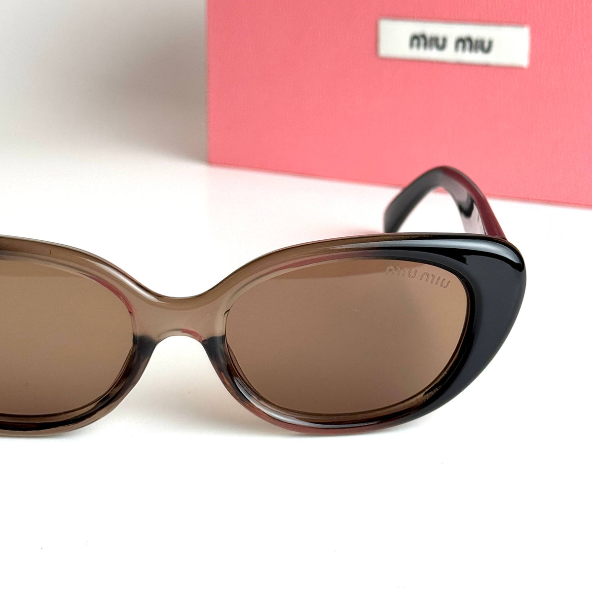 Miu Miu Oval SMU09Z – Black Brown