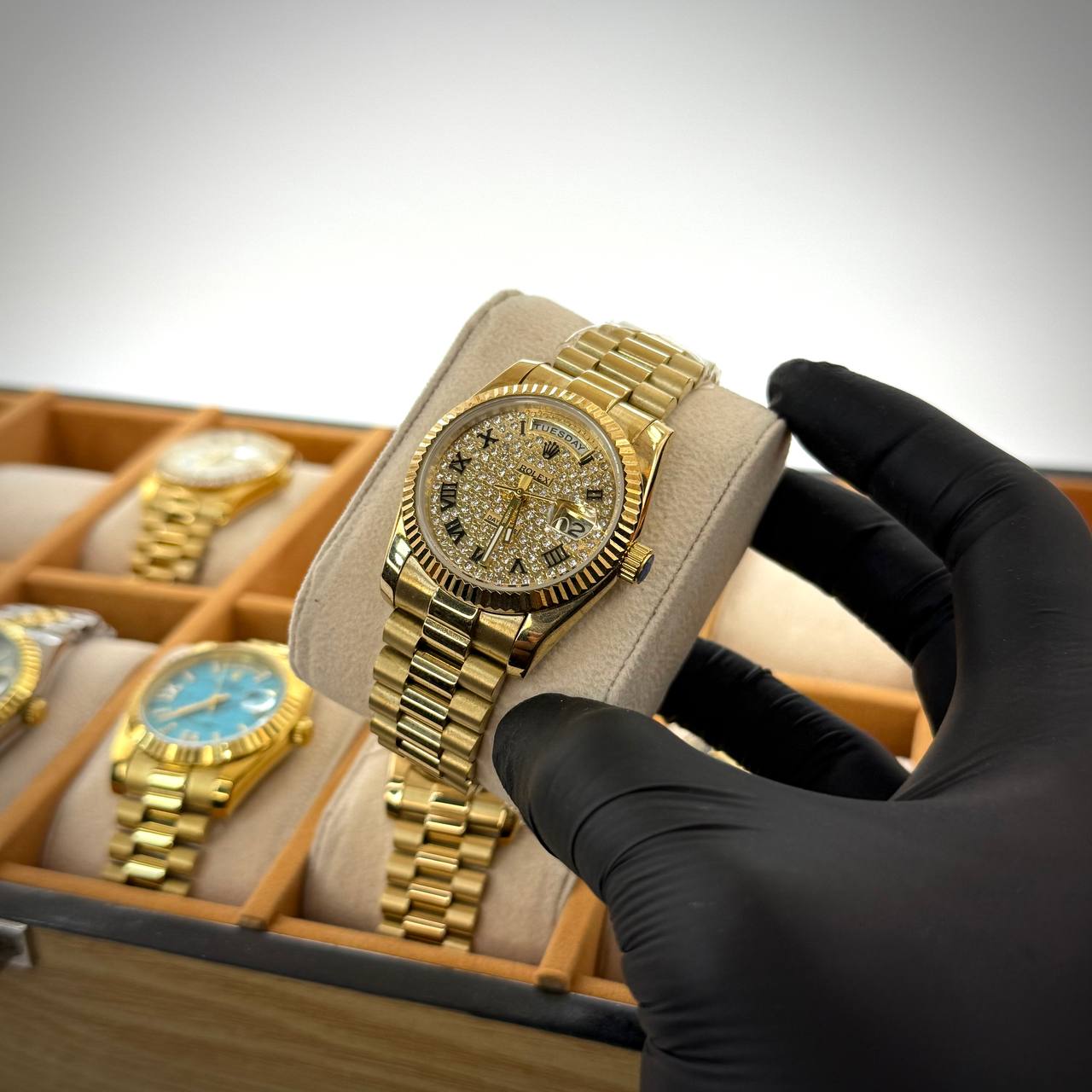 Rolex Day-Date – Gold / Roman Black / Full Iced Dial (Women)