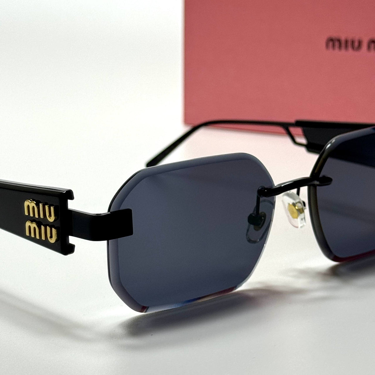 Miu Miu Rectangular Rimless SMU12Z – Black