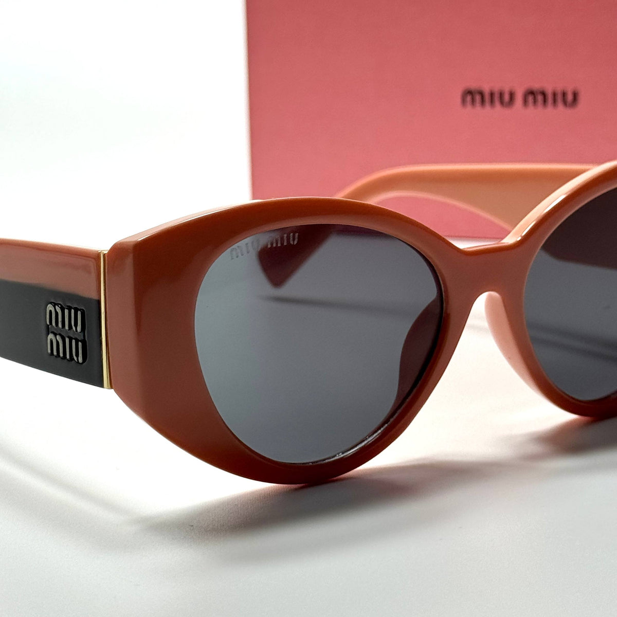 Miu Miu Oval SMU09Z – Brown Black
