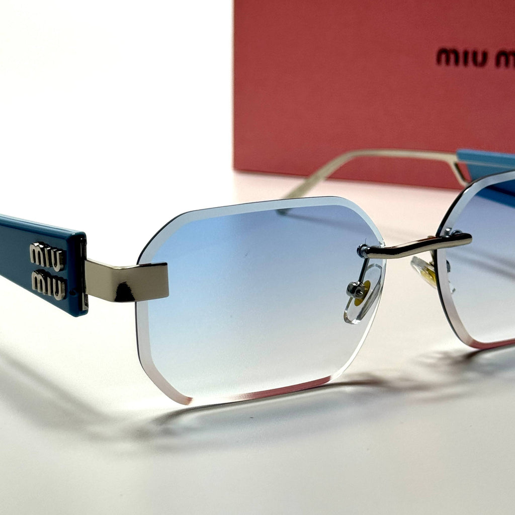 Miu Miu Rectangular Rimless SMU13Z – Blue Silver