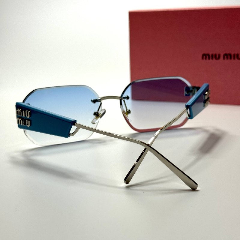 Miu Miu Rectangular Rimless SMU13Z – Blue Silver