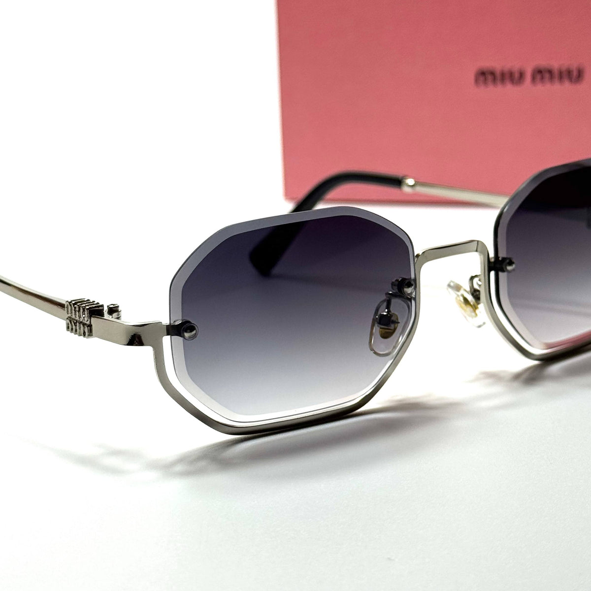 Miu Miu Rimless Octagonal SMU71Z – Silver Grey