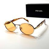 Prada Oval PR52 – Gold Orange