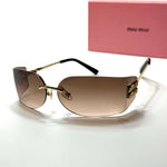 Miu Miu Shield SMU69Z – Gold Brown
