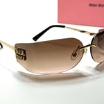 Miu Miu Shield SMU69Z – Gold Brown