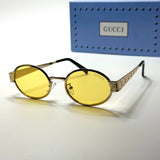 Gucci Oval GG7184 – Gold Yellow