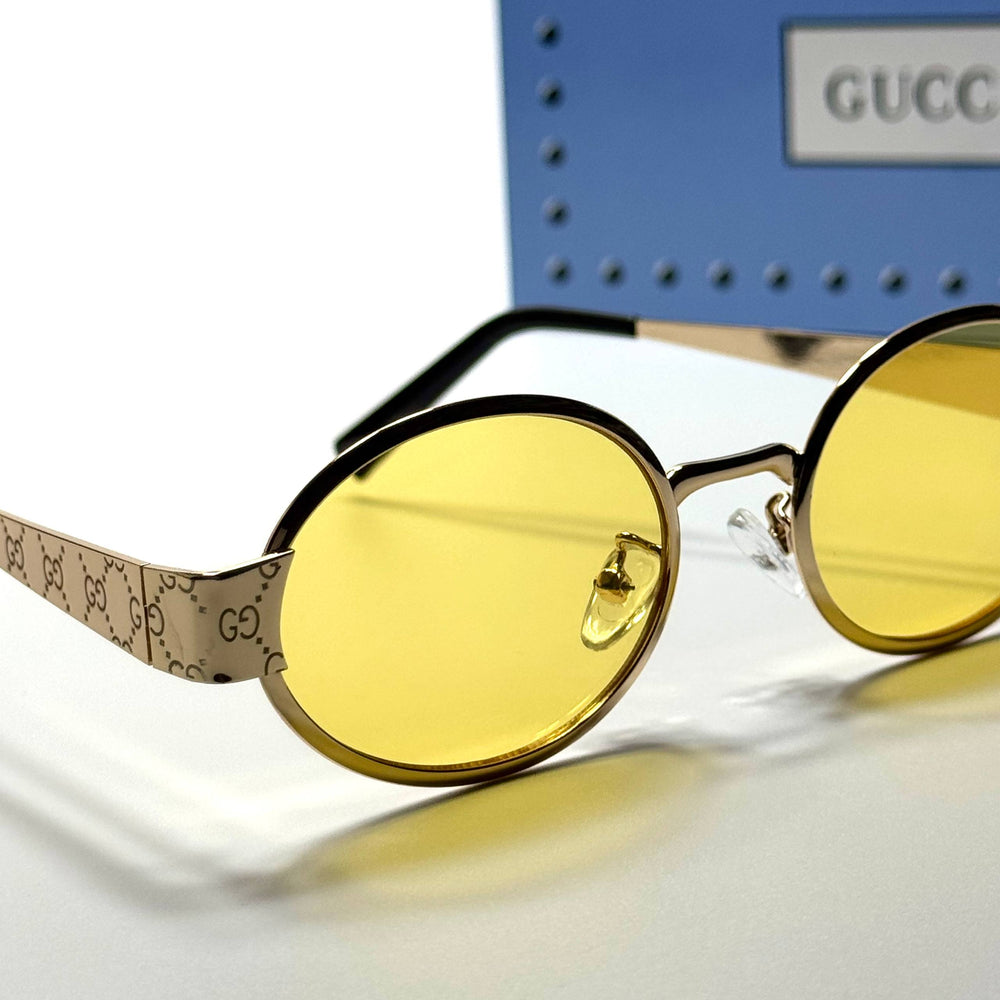 Gucci Oval GG7184 – Gold Yellow
