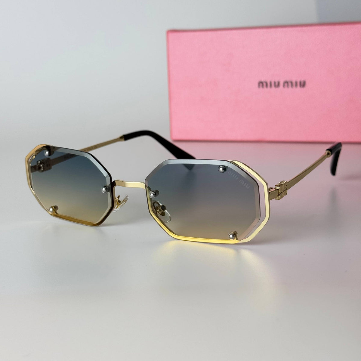Miu Miu Geometric Rimless - Gold Grey Gradient