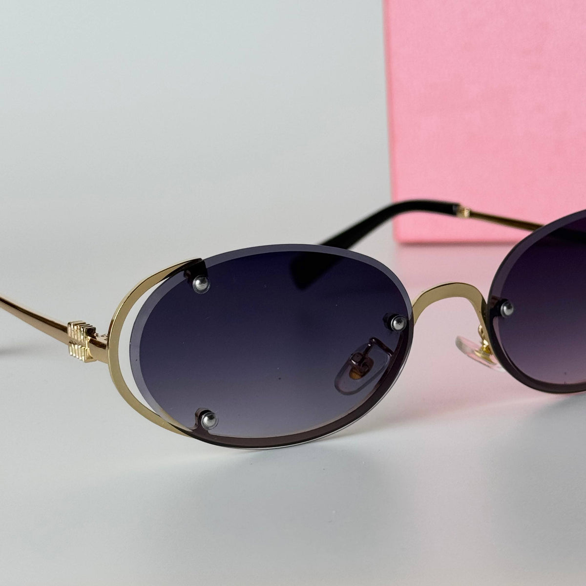 Miu Miu Oval Rimless - Gold Violet