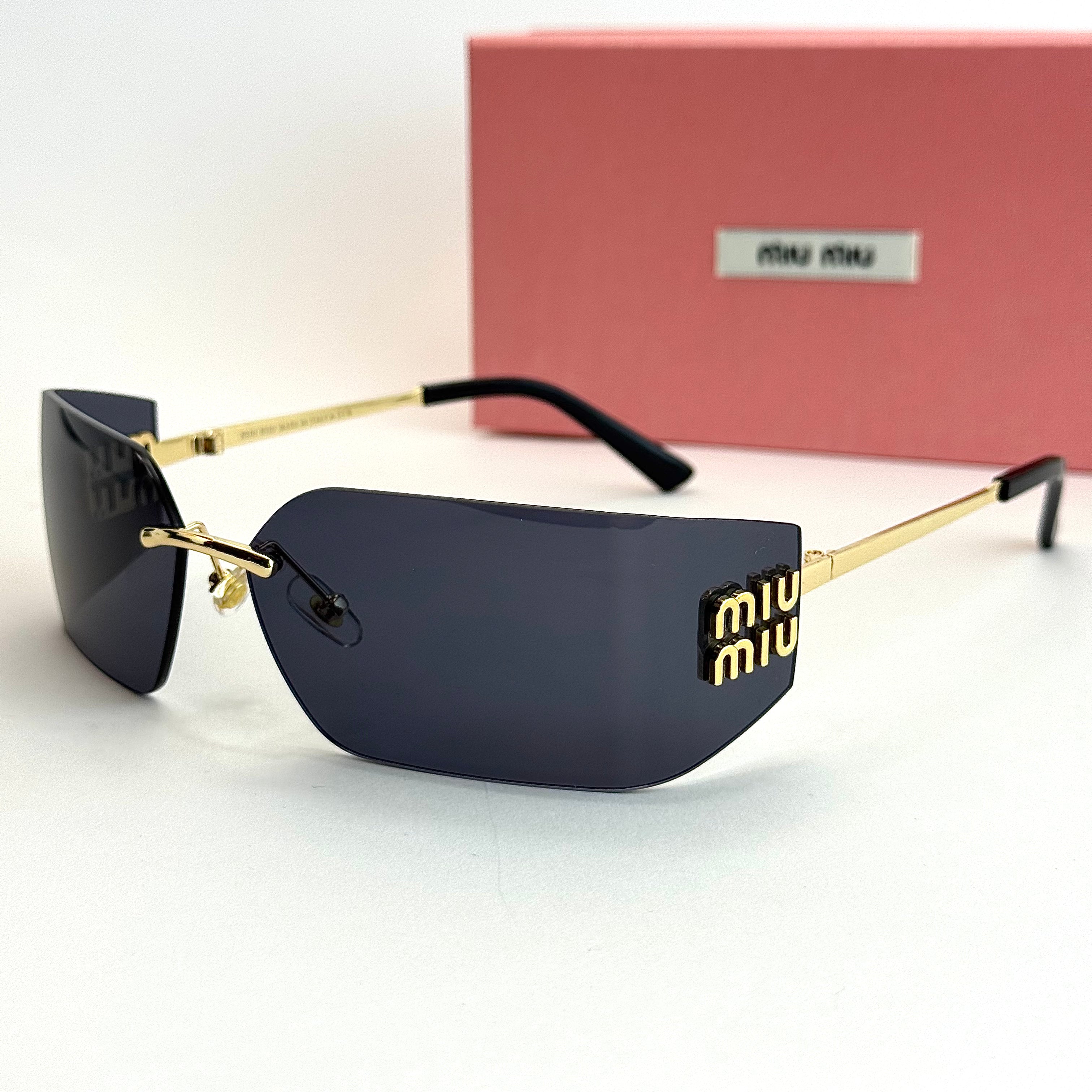 Miu Miu SMU-219 – Black Gold