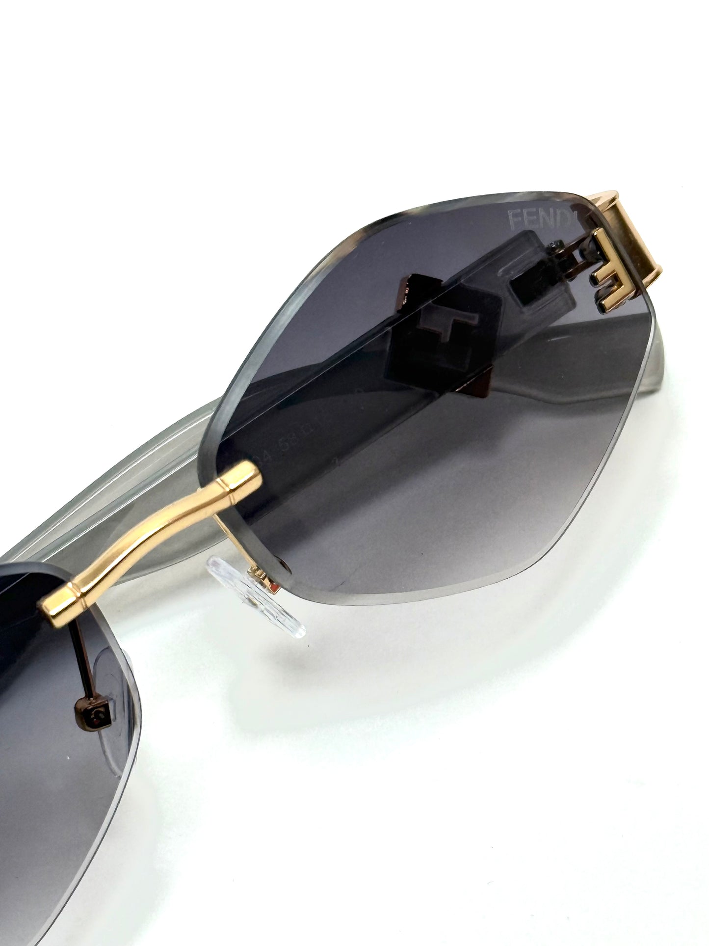 Fendi FF Logo Rimless – Gold Grey