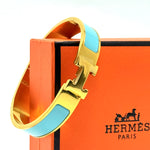 Hermès Clic H – Gold Blue