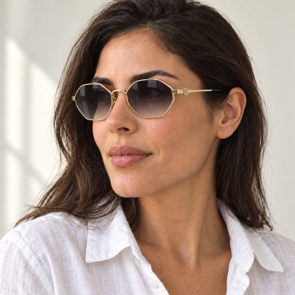 AI-generated styling image: model wearing Miu Miu Oval Geometric SMU56Y – Gold Grey Gradient sunglasses. Fit and scale are illustrative. October 2026 refresh.